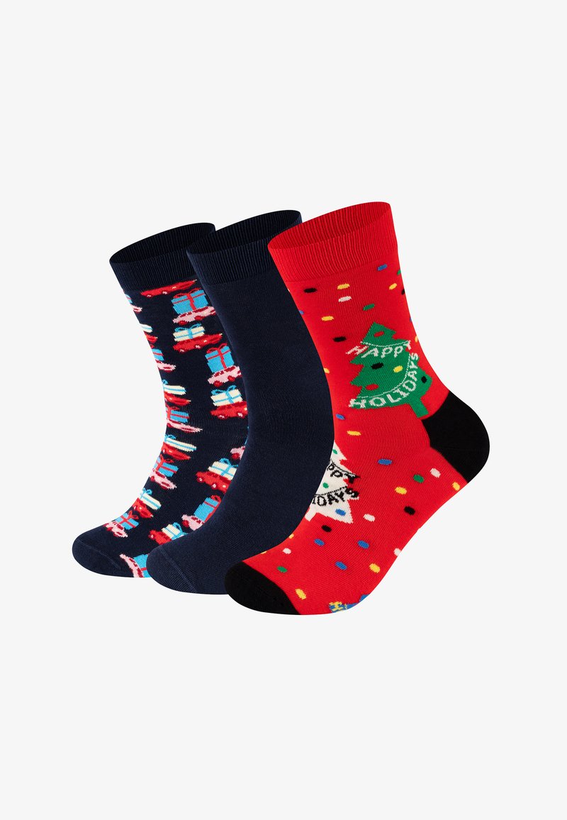 Trois paires de chaussettes : une rouge avec un sapin de Noël et le message 'Joyeuses Fêtes', une bleue marine avec des motifs de cadeaux, et une unie bleue marine. Mélange de coton.