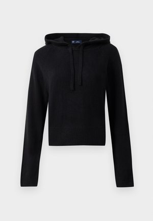 Črno dolgi rokavi pletena kapuca s vrvicami, ribanimi manšetami in robom, skrajšana silhueta, prikazana na beli podlagi.