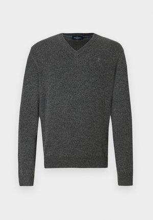 Gray v-neck sweater made of soft fabric. Features ribbed cuffs and hem, with a small embroidered logo on the chest. Simple design, classic fit.