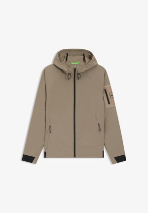 Bézs kapucnis dzseki fekete cipzárral, fekete húzózsinórokkal, cipzáras oldalzsebekkel, fekete mandzsettákkal és cipzáras foltzsebbel a bal ujján.