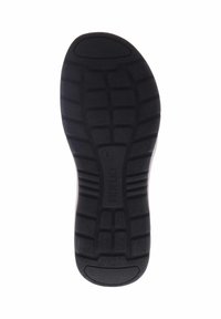 Zwarte rubberen schoenzool met een profielpatroon dat verhoogde groeven en getextureerde secties voor grip bevat, gemarkeerd met het merk "FIDELIO."