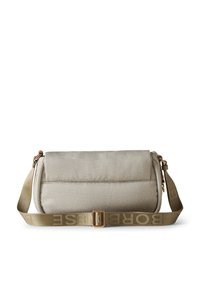 Beige textured crossbody bag with a padded closure and adjustable olive green strap featuring logo. Bronze hardware accents.