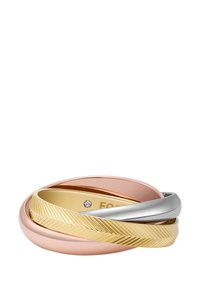 Bagues empilées en argent, or et or rose. Présentent une finition lisse, un design tordu et un anneau en or texturé avec des lignes diagonales.