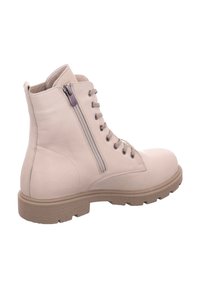 Light beige leather ankle boot with a rounded toe, lace-up front, and side zipper. Thick, ridged rubber sole. Smooth texture, minimalist design.