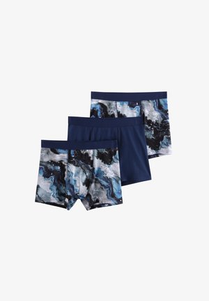 Three pairs of boxer briefs: one solid navy, two with a blue, black, and white marble pattern. Made from soft, stretchy fabric.