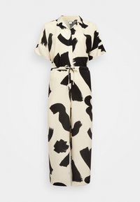 Combinaison noire et crème à manches courtes avec un motif abstrait de coups de pinceau, col et ceinture ajustable à la taille. Tissu lisse et design à jambes larges.