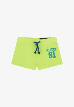Costum de baie verde neon cu un brâu elastic și un șnur albastru. Prezintă „GUESS 81” în albastru pe partea din față. Material neted.
