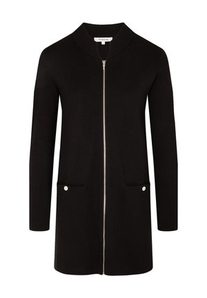 Zwarte lange cardigan met een rits aan de voorkant, kraaghals, twee voorzakken en subtiele zilveren hardware-accenten. Glad, effen stoftextuur.