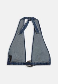 Denim bralette with a halter tie design. Features exposed stitching, silver hardware, and a deep V shape. Soft, textured fabric.