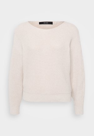 Hele beež kampsun, millel on ümmargune kaelus, pikad varrukad ja soonikuga mansetid. Kangas on kaunistatud tekstuuriga mustriga.