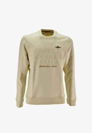 Felpa beige a maniche lunghe con testo in rilievo "Frecce Tricolori Italia", scritta "Aerobatic Team - Rivolto" e emblemma con ali sul petto.