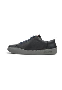Black leather sneaker with a smooth texture, gray rubber sole, navy blue laces, and subtle branding on the heel. Rounded toe design.