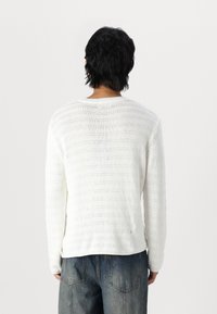 Night Addict Pullover - cream