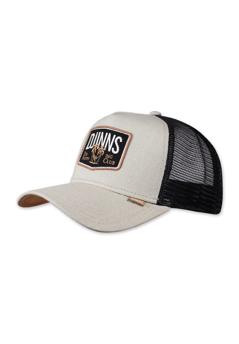 Helle beige Mesh-Cap mit einem schwarzen Patch, auf dem "DUNNS" und ein Löwengrafik zu sehen sind, brauner Stickerei und einem gebogenem Schild mit einem sandfarbenen Akzent.