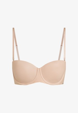 Reggiseno beige senza spalline con spalline regolabili e rimovibili e coppe sagomate, progettato per un sostegno e una forma senza cuciture.