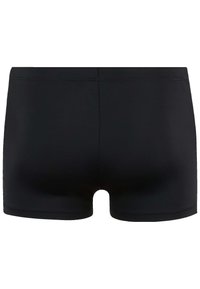 Costumi da bagno neri con una texture liscia, lunghezza fino a metà coscia e un design aderente. Inclusi una cintura ampia e senza cuciture visibili.
