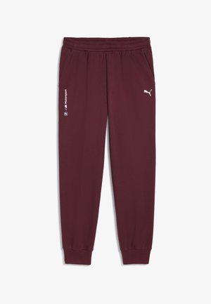 Pantaloni della tuta color bordeaux realizzati in tessuto morbido, dotati di una vita elastica, tasche laterali e loghi bianchi di Puma e BMW Motorsport.