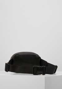 Topshop Vyölaukku - black