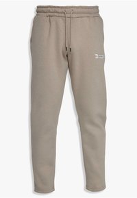 Beige sweatpants with an elastic waistband and drawstring, featuring cuffed ankles and embroidered logo on the side. Soft fabric texture.
