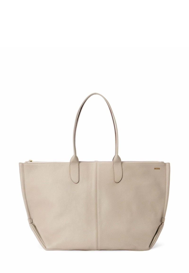 Beige læder tote taske med dobbelte håndtag. Tekstureret overflade, struktureret facon og guld lynlåsdetalje. Minimalistisk design uden synlige logoer.