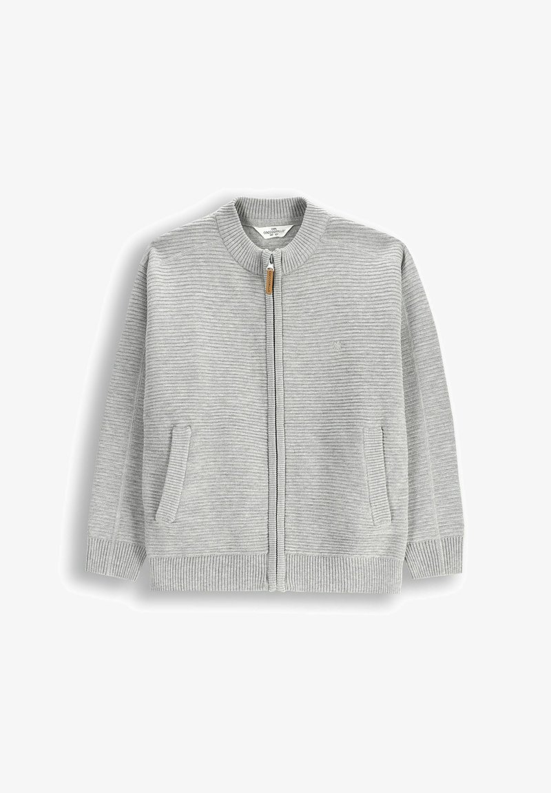 Szary kardigan na zamek z materiału prążkowanego. Posiada zaokrąglony kołnierz, dwie boczne kieszenie i drewniany uchwyt zamka.