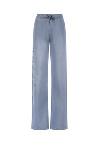 Lichtblauwe denim broek met wijde pijpen, een elastische tailleband, trekkoordsluiting en bloemenborduursel langs één kant.