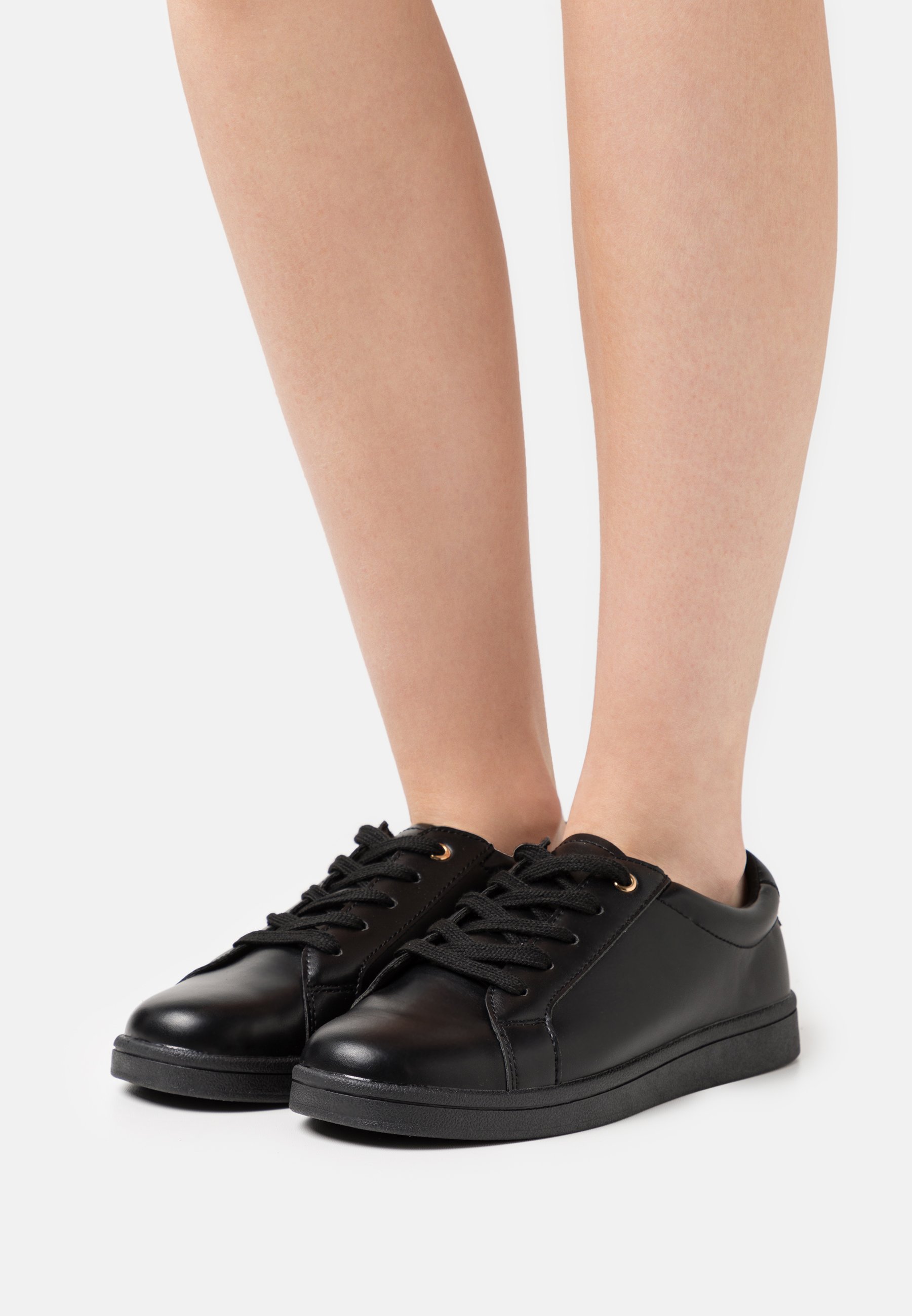 black dress trainers