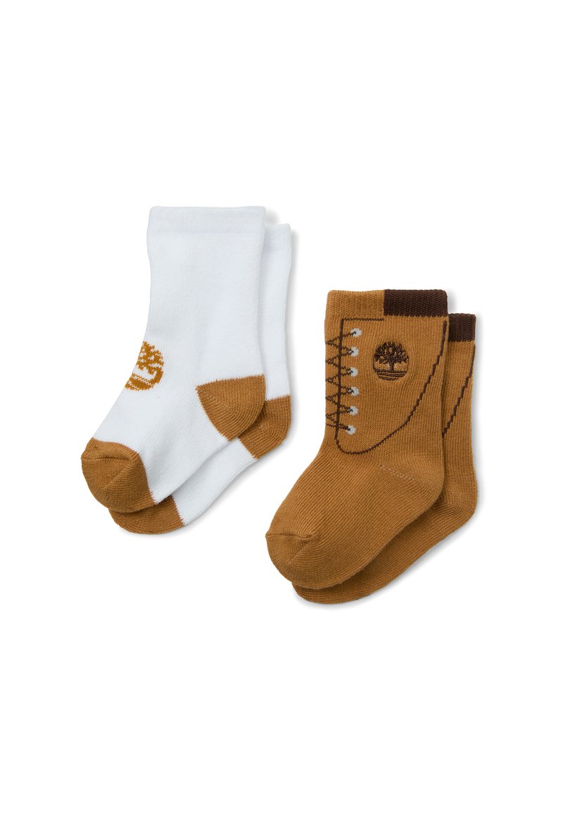 Ensemble de deux paires de chaussettes : une blanche avec un revers marron et un logo, une marron avec un motif de bottes et un logo. Tricot lisse, hauteur cheville.