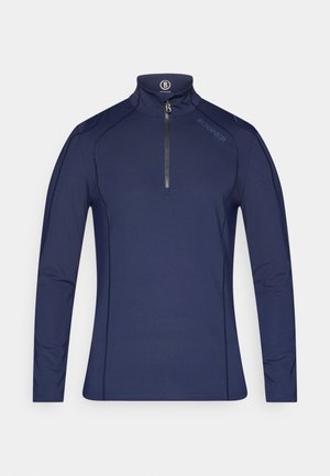 Pull sur-chemise bleu marine à manches longues et demi-fermeture éclair en tissu lisse et extensible. Doté de coutures contrastantes et d'un col montant avec une étiquette de marque.