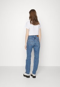 Levi's® 70S HIGH SLIM STRAIGHT - Calças de ganga de perna direita - sonoma case