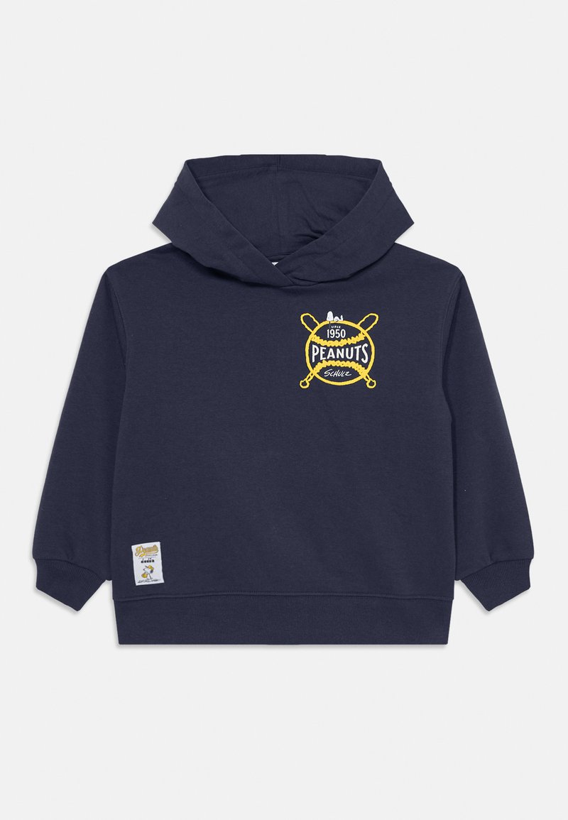 Tumši zilā kapucīna krekls ar lielu dzeltenu "Peanuts" logo un krusteniskas nūjas dizainu. Iespējams ar kangaro kabatu un ribotām piedurknēm. Mīksts kokvilnas materiāls.