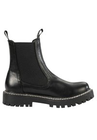Bottine Chelsea en cuir noir avec panneau latéral élastique, languettes de tirage en haut, semelle crantée épaisse et coutures blanches autour du bord de la semelle.