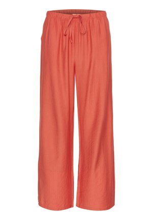 Pantalones de pierna ancha en color coral con cintura elástica y cordón, confeccionados en tejido ligero. Presentan una textura suave y caen sueltos por debajo del tobillo.