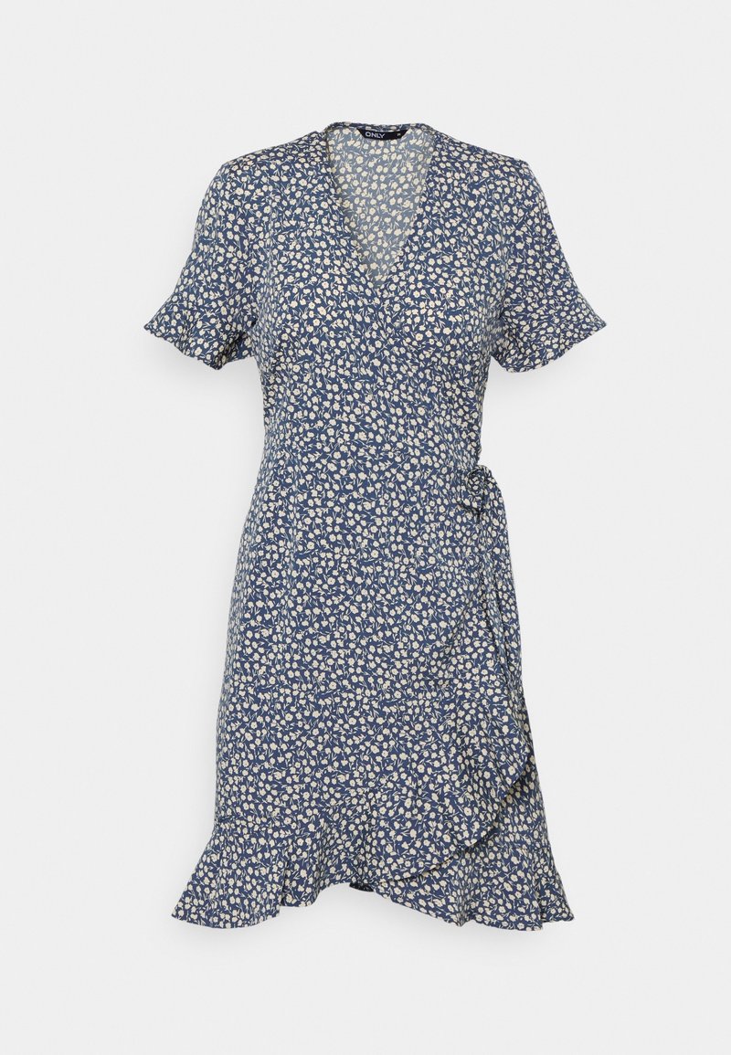 Floral wrap dress in navy blue with white pattern, short ruffled sleeves, a V-neckline, and a tie waist detail. Flowy hemline.