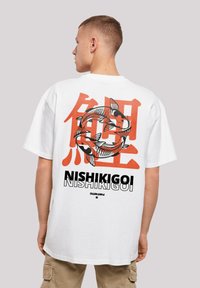 White cotton t-shirt featuring a circular graphic of koi fish and Japanese text in red and black. Relaxed fit with short sleeves.