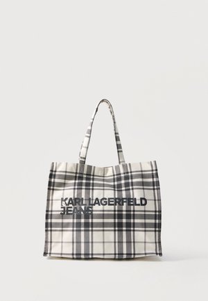 Borsa tote a quadri bianco e nero con due manici e scritta "KARL LAGERFELD JEANS" al centro davanti.