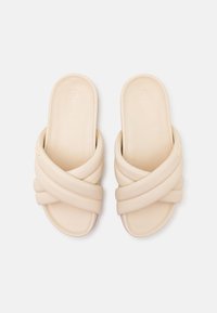 DKNY Platt slip-in - beige