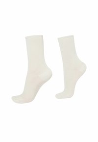 White ribbed crew socks made of a soft, smooth material with a standard fit and reinforced heel and toe sections.