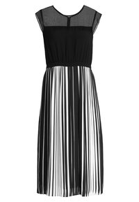 Schwarz-weißes Kleid mit einem durchsichtigen oberen Bereich, kurzen Ärmeln und vertikalen Streifen. Der Rock ist plissiert und reicht bis zur Mitte der Wade.