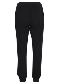 Sorte joggere med elastisk talje, tapered ben og smalle manchetter, lavet af blødt materiale med glat tekstur og uden synlige mønstre.