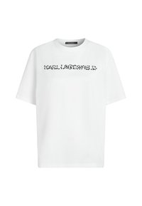 Balta trumpa rankovė T-marškiniai su apvalia iškirpte ir juodais taškeliais tekstiniu logotipu per krūtinę, užrašytu "KARL LAGERFELD."