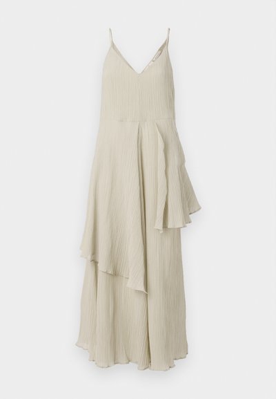 Cream-colored dress with a V-neckline, thin straps, and a flowing, layered design featuring textured pleats and asymmetric hems.