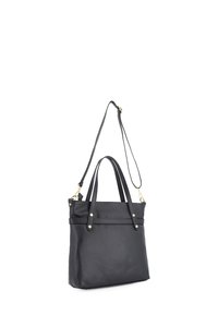 Sac à main en cuir noir avec deux poignées et une bandoulière réglable. Il présente des accessoires en métal doré et une surface texturée avec des coutures décoratives.