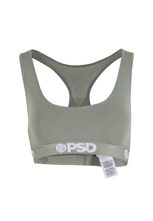 Soutien-gorge de sport en vert olive clair avec un dos nageur et de larges bretelles, logo PSD sur la bande élastique et une étiquette d'entretien pendue en bas.