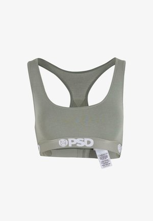 Hellgrünes Racerback-Sport-Bra mit breiten Schulterträgern, PSD-Logo auf dem elastischen Band und einem Pflegeetikett, das an der Unterseite hängt.