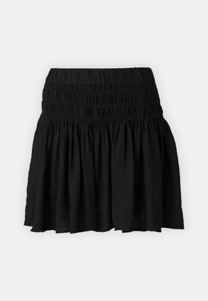 Jupe noire courte avec une taille élastiquée, présentant un design à volants et un tissu léger. Pas de motifs ni d'embellissements visibles.