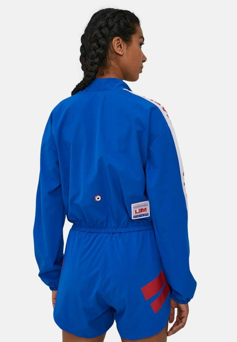 Damen Leichte Jacken | Labellamafia Trainingsjacke blau - BK12751 Damen Leichte Jacken | Labellamafia Trainingsjacke blau - BK12751