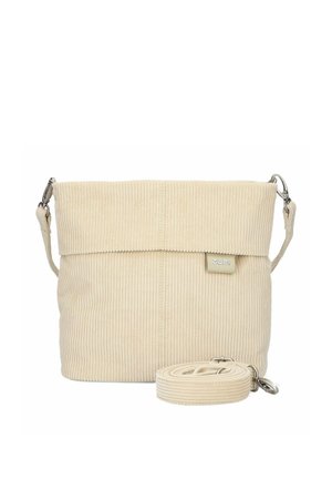 Beige corduroy shoulder bag with fold-over top and detachable strap, featuring subtle vertical ribbed texture and metal clasp attachments.