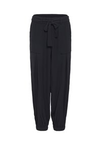 Pantalon noir ample avec des poignets élastiques, des poches devant et une ceinture en tissu nouée à la taille.