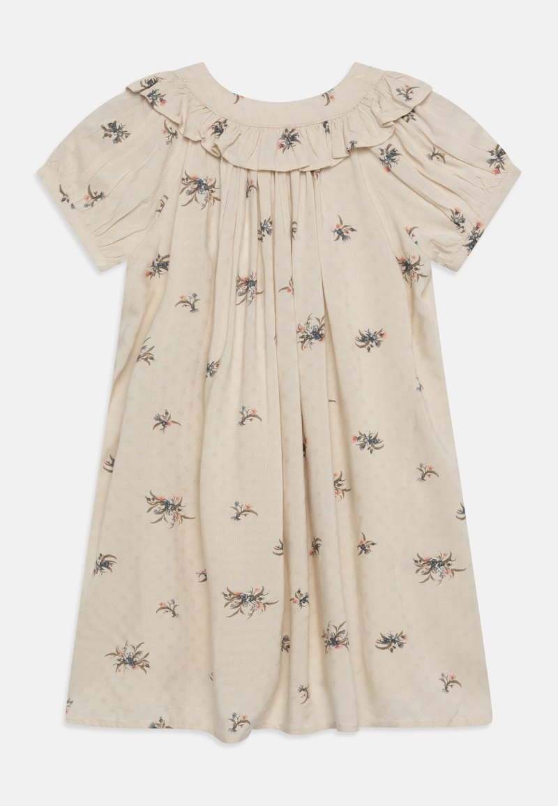 Kremowa sukienka z krótkim rękawem, zdobiona małymi kwiatowymi wzorami, z falbankowym kołnierzykiem oraz marszczeniami na klatce piersiowej i rękawach.
